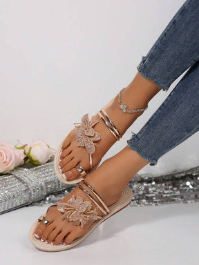 Sandália Rasteira Com Tiras Brilhantes E Aplicação De Flor Luxo