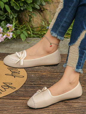 Sapatilha Mocassim Com Costura Aparente E Laço